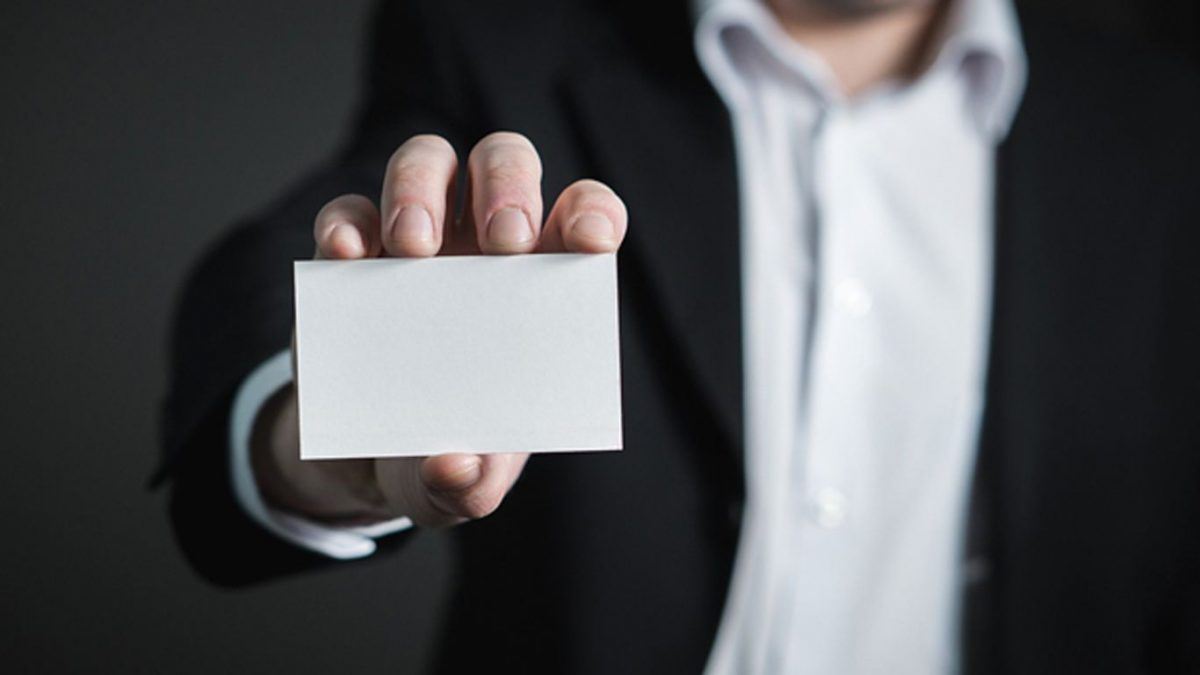 Image of a person holding a business card, Blog, Perfect Image Printers